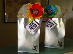 Poppies tied to gift bags