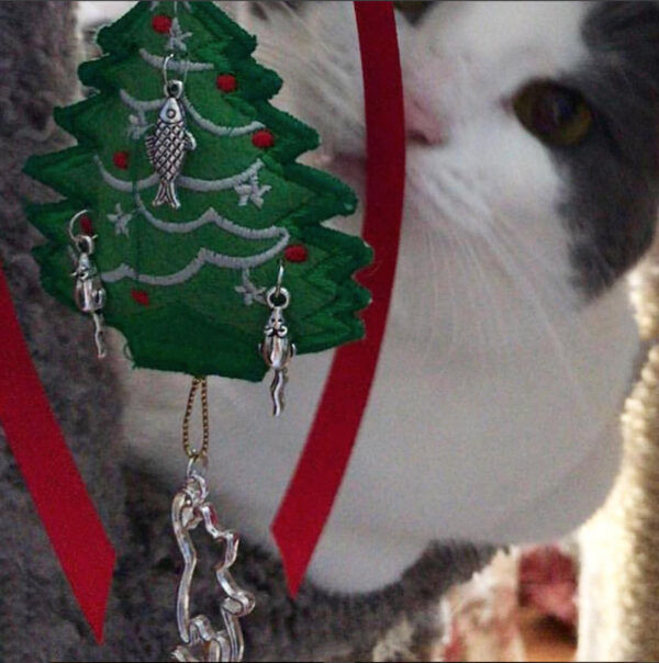 cat with tree ornament